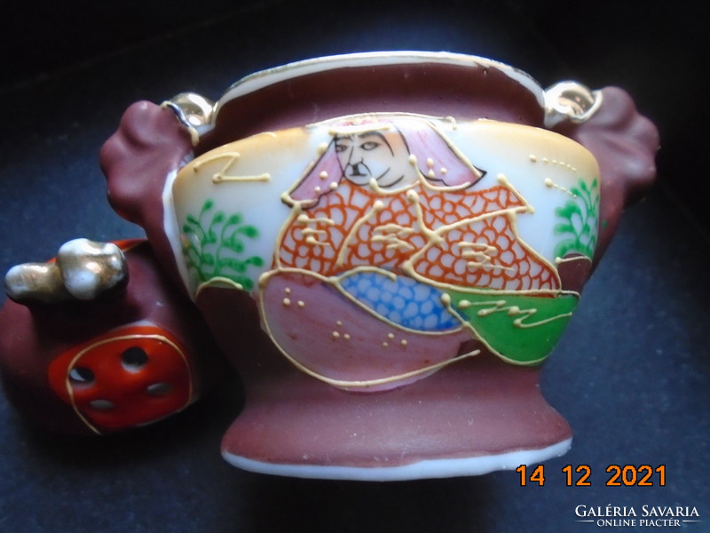 Satsuma moriage oval incense with a small dragon dog on the lid and a hand-painted rakan portrait