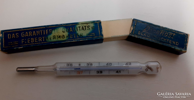 Old thermometer in thermometer case