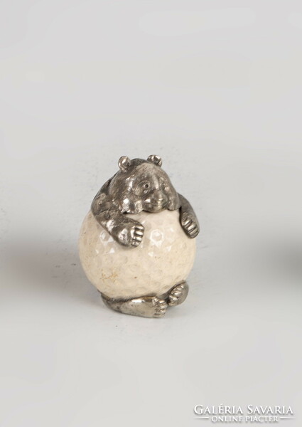 Silver panda figure with golf ball body
