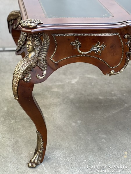 Richly decorated empire style desk with 3 drawers