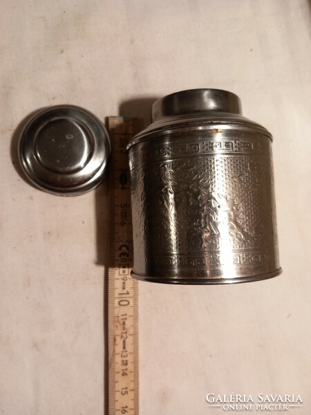 Some kind of metal jar (tea?)