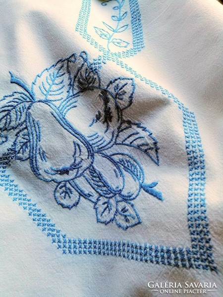 Richly embroidered linen tablecloth