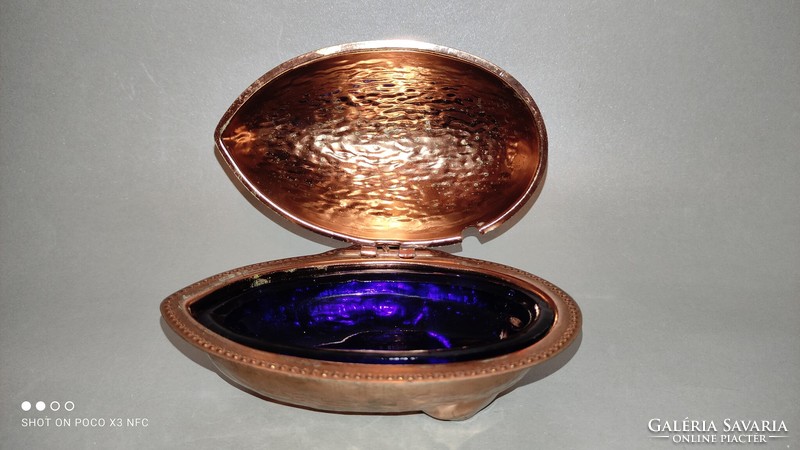Metal butter or caviar holder with a shiny colored glass insert