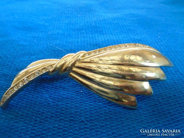 Old brooch with unique sparkling zirconium