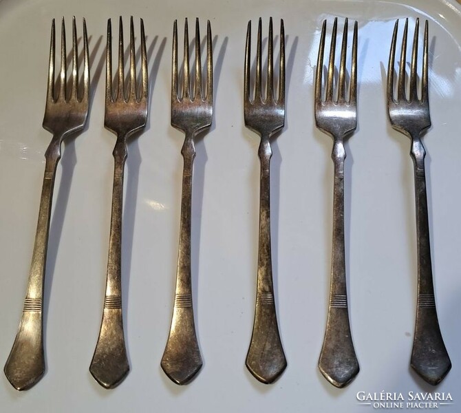 Six marked antique alpaca forks