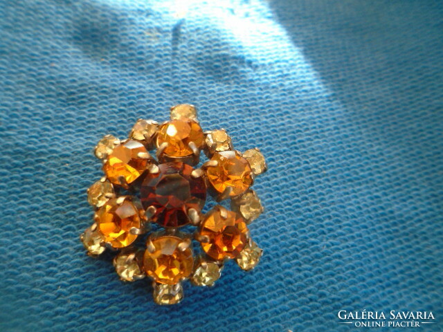 Old brooch with sparkling stones