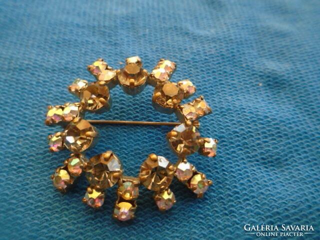 Old brooch with sparkling stones