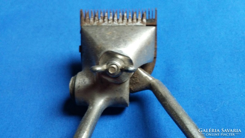 Old marked metal hand clipper