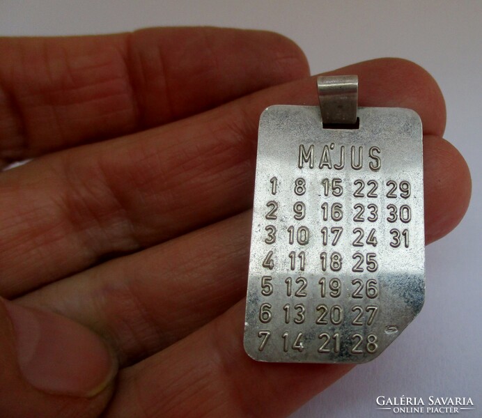 Special calendar silver pendant