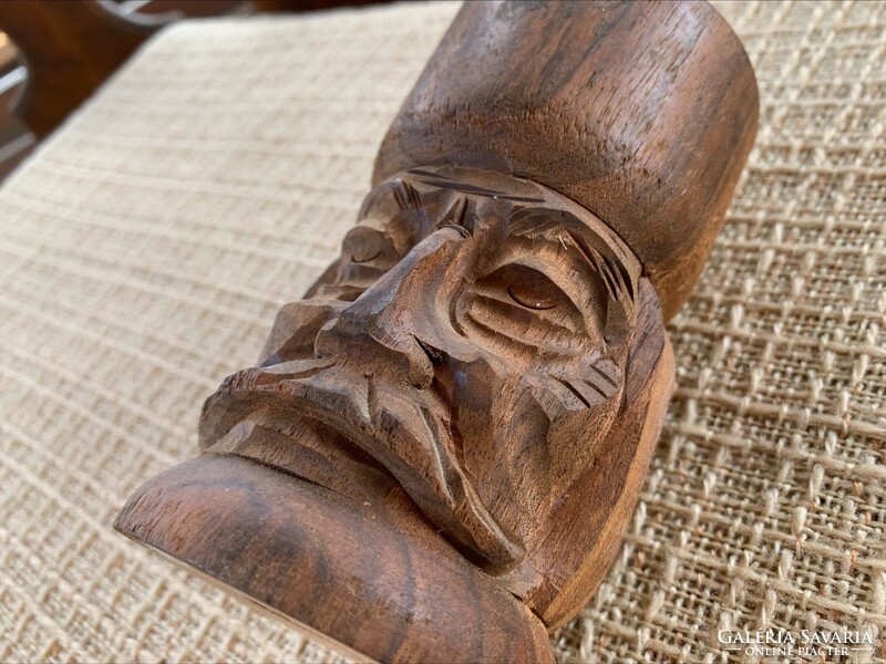Antique carved wooden candle holder, peasant man wearing mustache
