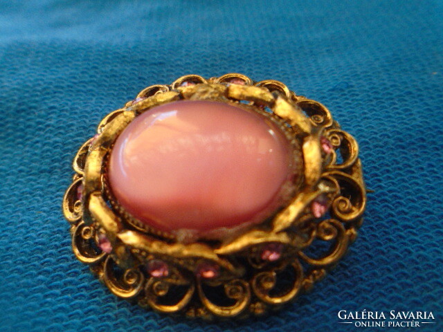 Old brooch colored half-bite to stone v. Pink to deep pink