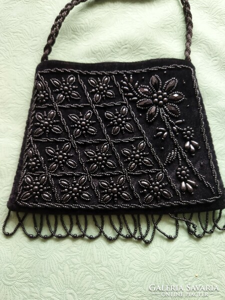 Black casual bag decorated with pearls