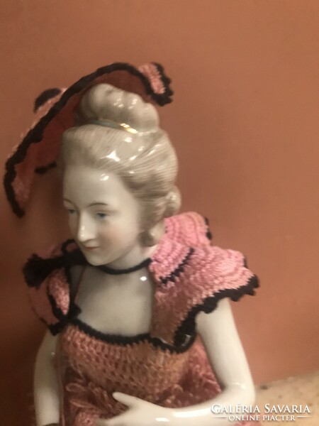 A wonderful tea doll in her original outfit