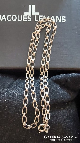 Old silver necklace made of special, polished eyes