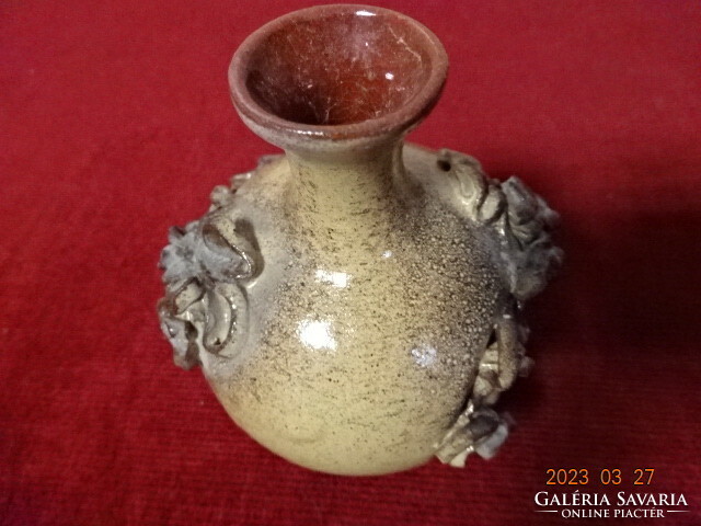 Glazed ceramic vase with a raised pattern, height 8.5 cm. The sugar bowl is signed. Jokai.