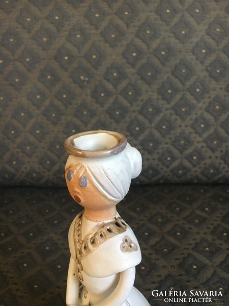Glazed ceramic candlestick, female figure