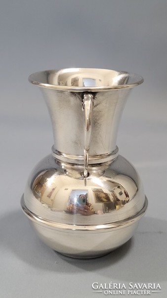 Old silver vase with two ears