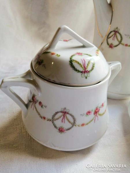 Porcelain teapot, spout and sugar bowl