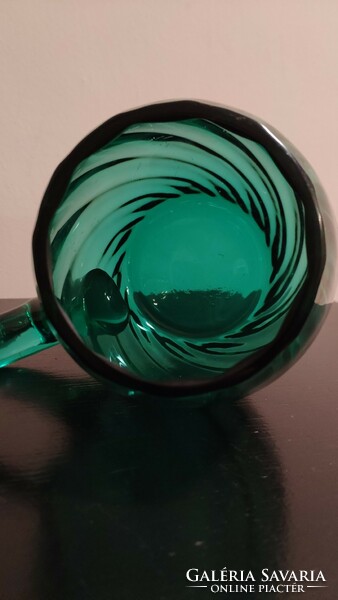 Emerald green glass mug with twisted pattern