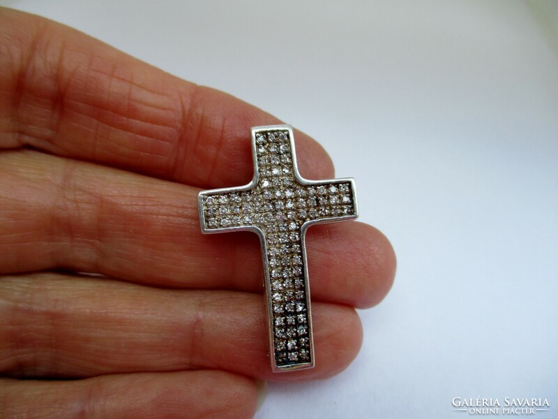 Beautiful silver cross pendant with small white stones