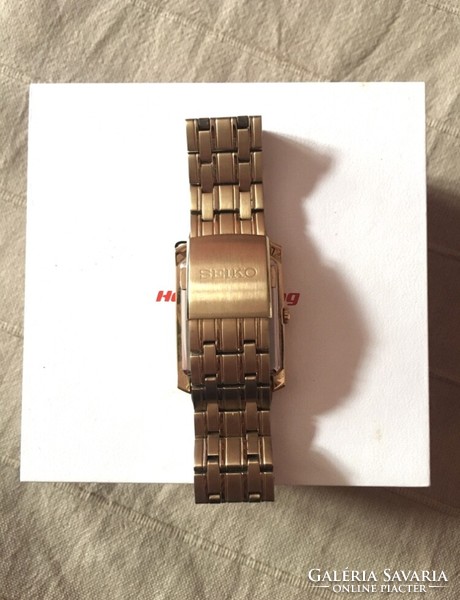 Seiko sapphire gold colored men's quartz wristwatch