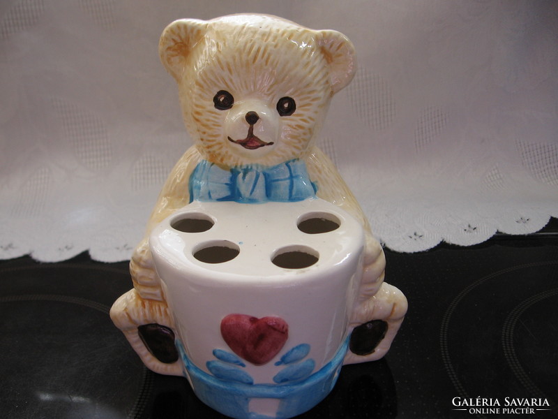 Ceramic teddy bear figurine with toothbrush and pencil holder