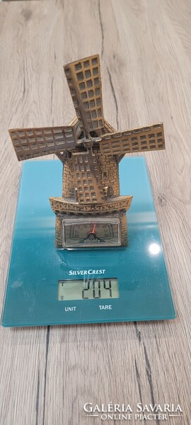 Old copper windmill thermometer.