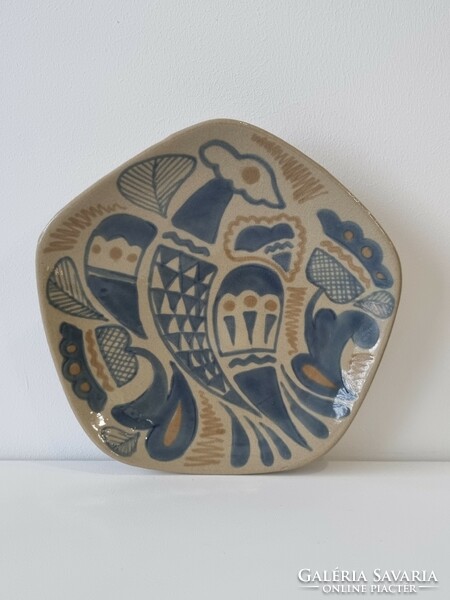 Vintage stoneware decorative wall bowl with pleasant pastel colors