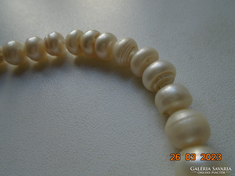 Necklace made of 93 real pearls with 925 marked silver clasp