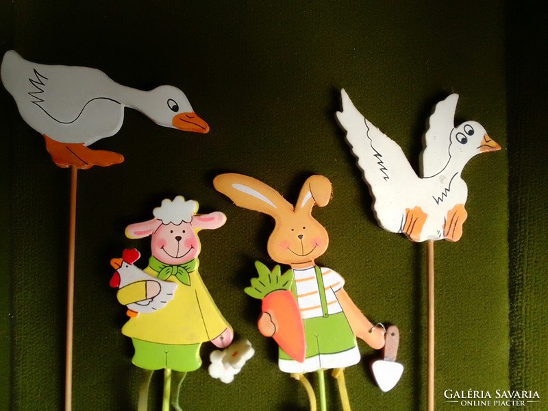 Four painted colorful wooden stick figure goose goose rabbit bunny lamb hen Easter spring decoration