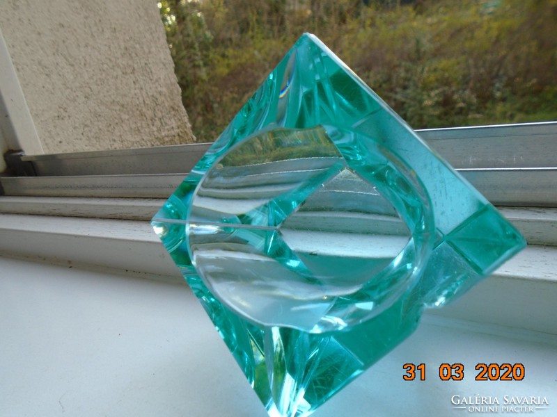 Faceted turquoise crystal decorative glass with an oval recess