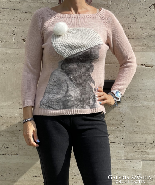 Pink knitted Italian hoodie with a woman's head on the front