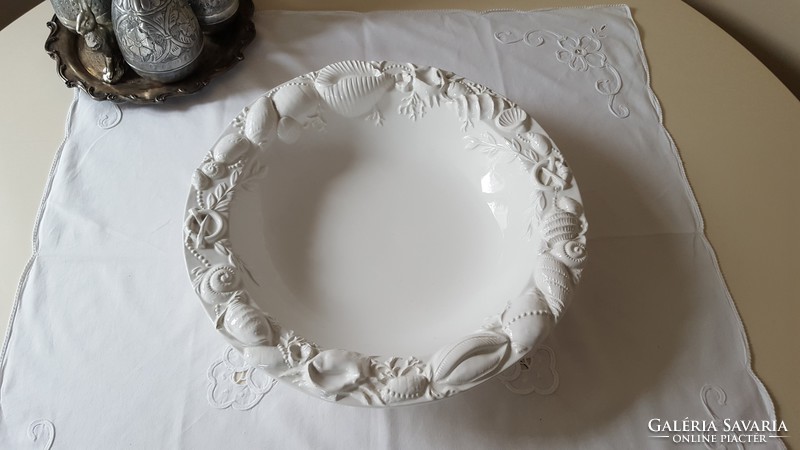 Huge serving bowl with relief on the rim