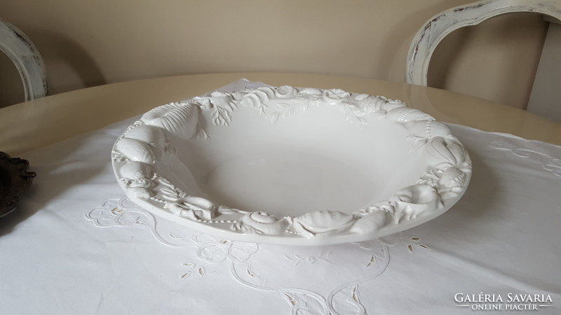 Huge serving bowl with relief on the rim