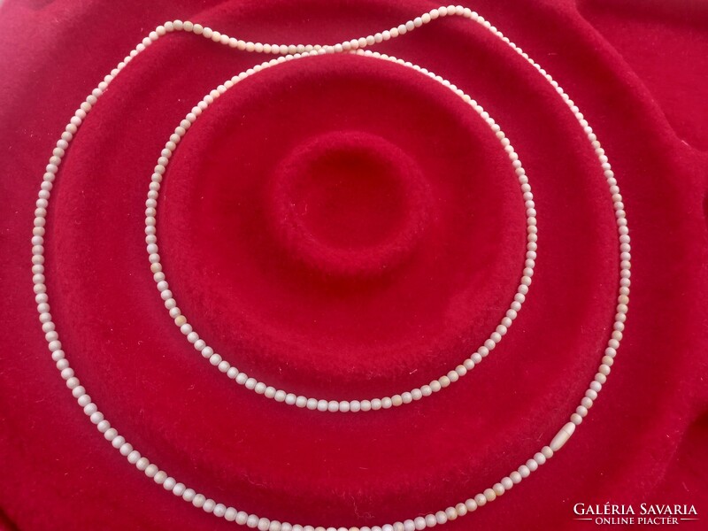 Hand-polished, string of bone beads, 150 cm