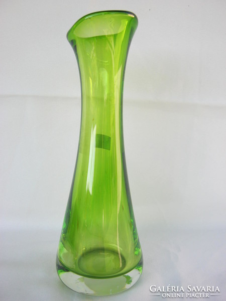 Hermann crystal in green glass vase