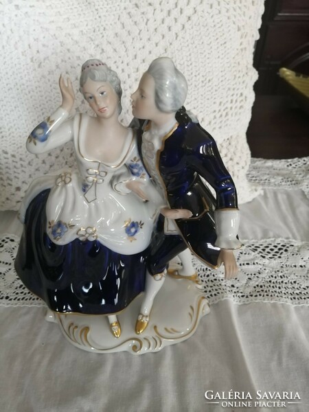 Baroque porcelain figures marked Royal doux!