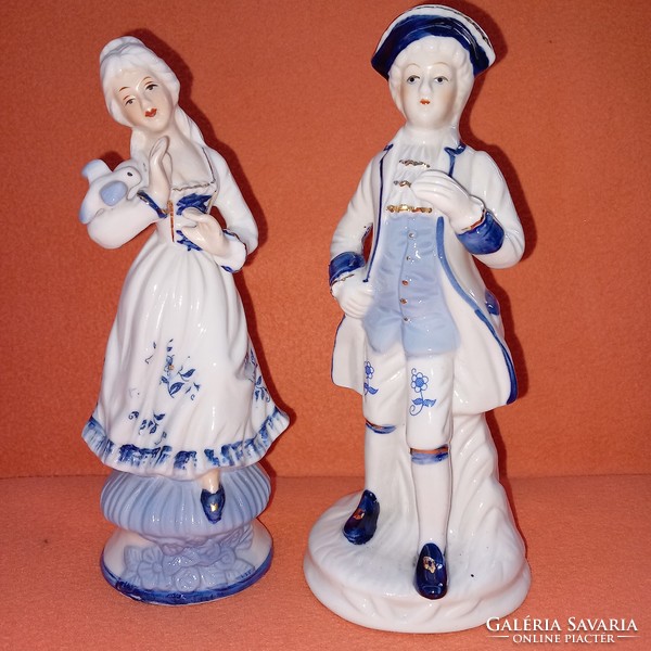 Pair of 2 baroque style porcelain figurines.
