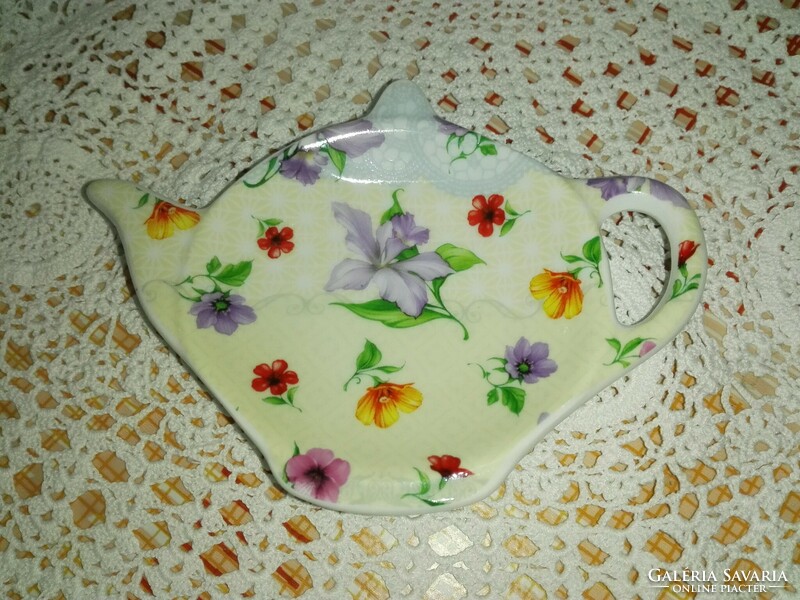 Porcelain tea filter holder.