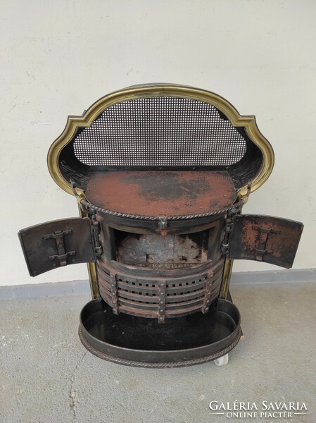 Antique stove, elegant, large enameled iron with patinated brass fittings and ash front 627 7231