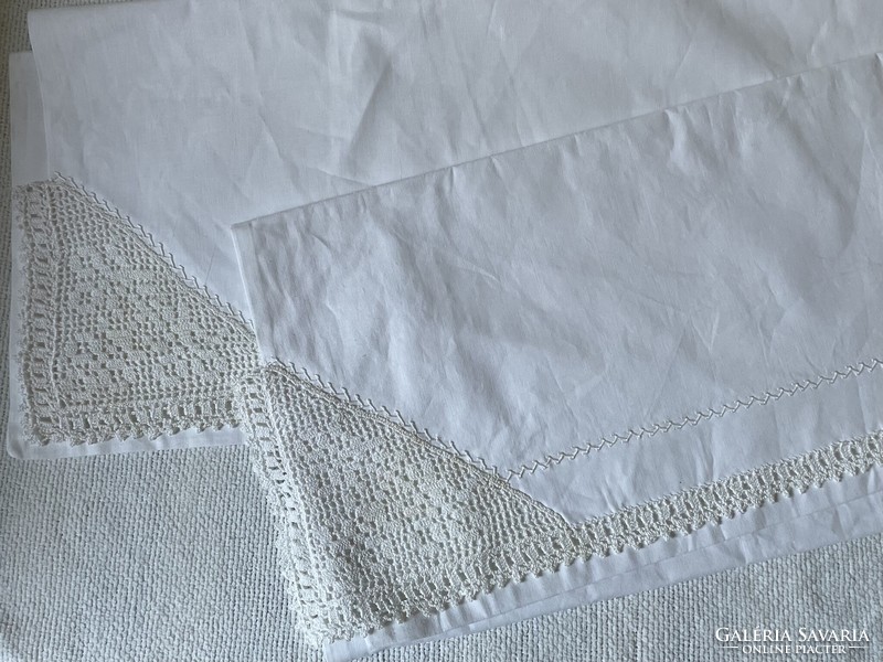 Crisp, uninitiated, snow-white, crocheted linen cushion covers