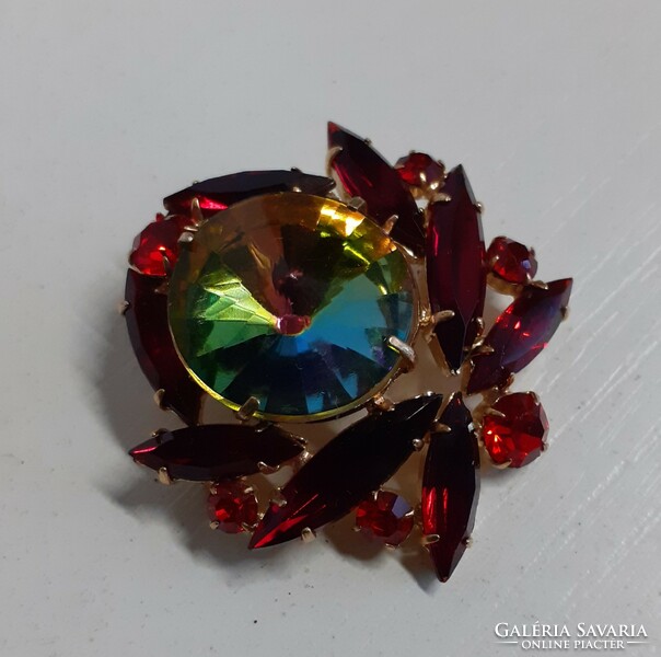 Retro beautiful brooch with gilded polished set stones and a large Murano stone in the middle