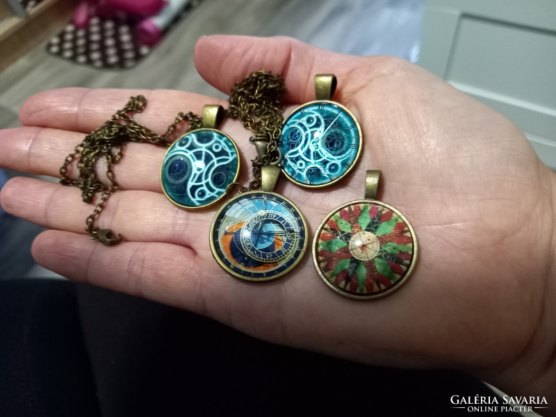 Bronze and silver-plated pendants, compasses, amulets with steampunk glass lenses