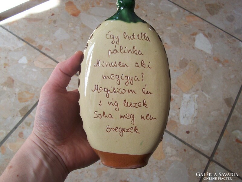 Bottle with folk brandy inscription