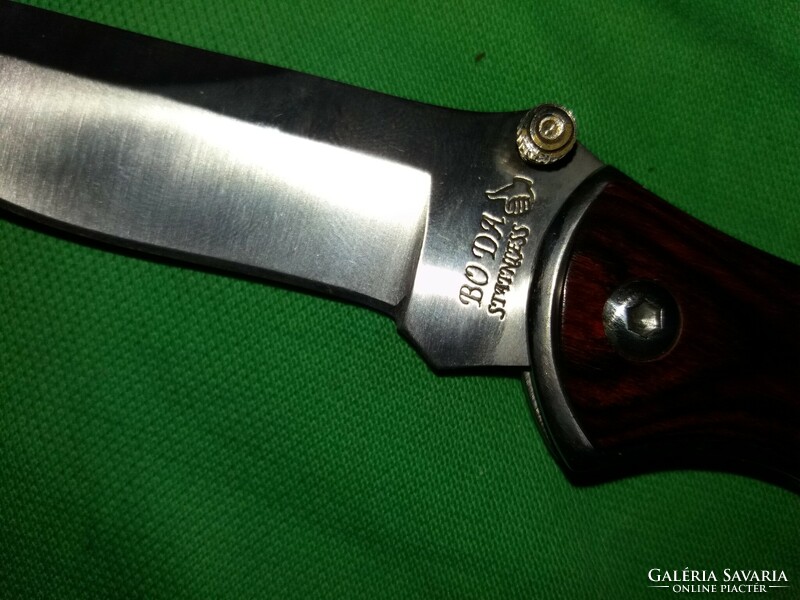 Retro boda knife with a wooden handle with a safety lock, as shown in the pictures
