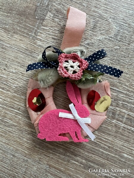 Easter decoration with bunny wax, bow and ribbon ornament
