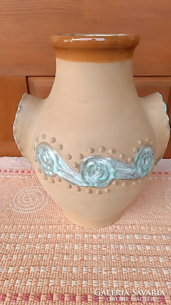 Ceramic vase with plastic decor