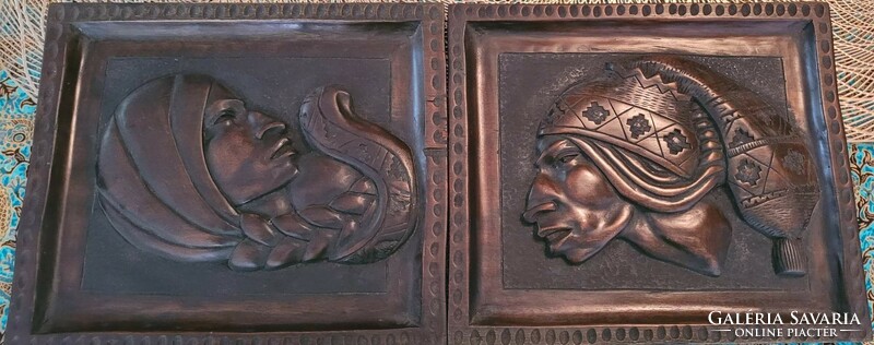 Bolivian woman and man Indian wood carving