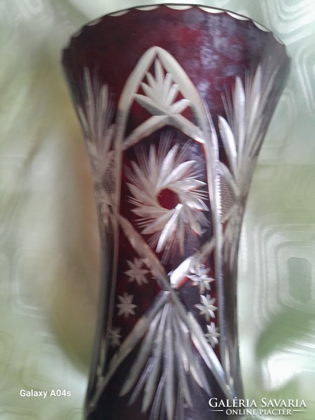 The burgundy polished vase is flawless