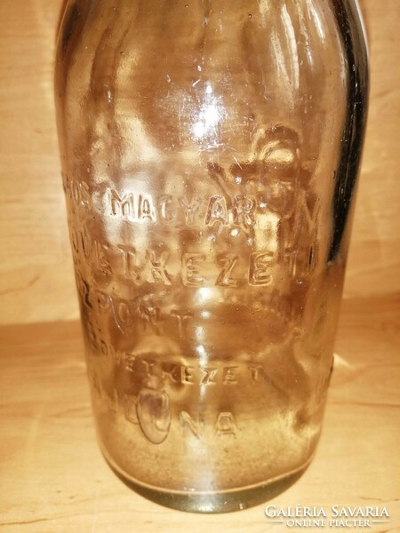 Old milk bottle inscription: national Hungarian milk cooperative center, 1 liter